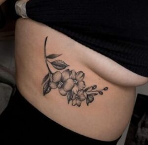 Side Boob Under Flower Tattoo