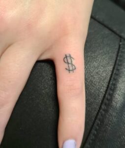 Simple Dollar Sign Finger Tattoo