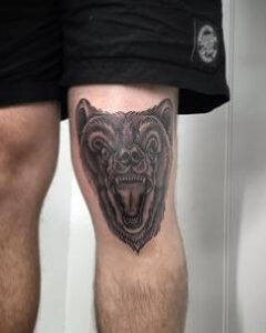 bear knee cap tattoo 4