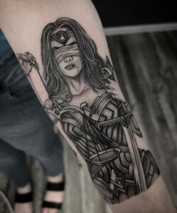 black wonder woman tattoo