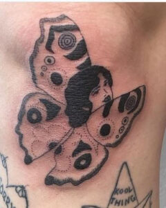 butterfly knee cap tattoo 2