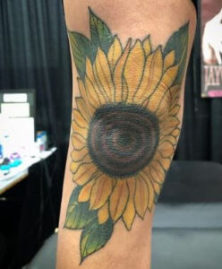 flower knee cap tattoo 2
