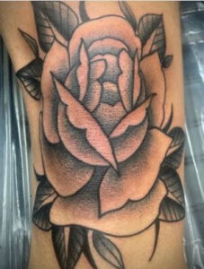 knee cap rose tattoo 3