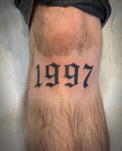 number knee cap tattoo