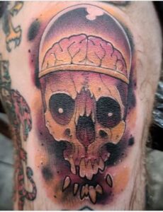skull knee cap tattoo 2