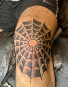 spider web knee cap tattoo 2