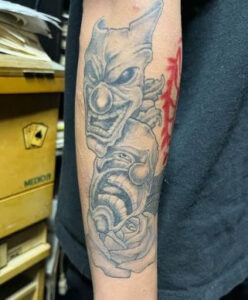 two face clown tattoo