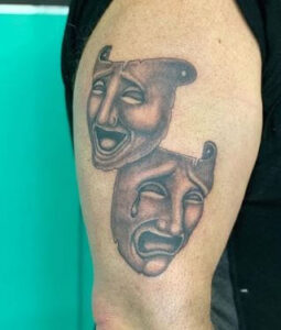 two face depression tattoo 3