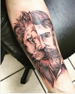 two face lion tattoo