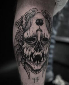 two face skull tattoo