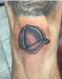 under knee cap tattoo