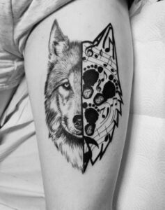 wolf two face tattoo