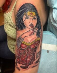 wonder woman pin up tattoo 2