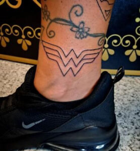 wonder women tattoo on leg