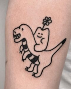 Dinosaur doodle tattoo