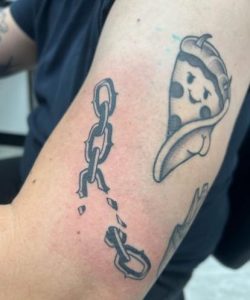 Broken Chain Arm Tattoo