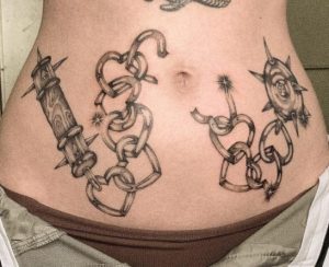 Broken Chain Stomach Tattoo