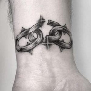 Broken Chain Wrist Tattoo