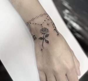 Chain Floral Wrist Tattoo