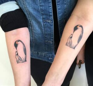 Mother-Daughter Duo Penguin Tattoo