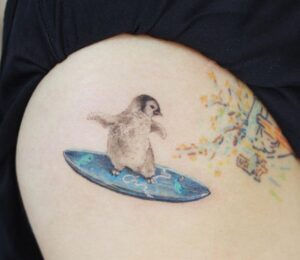 Penguin Surfboard Tattoo