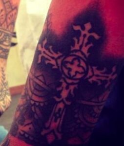 Rihanna's Large Cross Wrist Tattoo