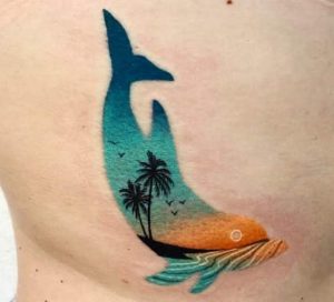 Dolphin Tattoos With A Sunset Design