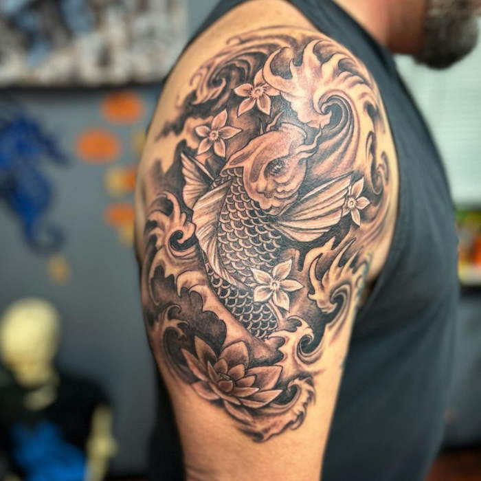 Koi fish tattoo on shoulder