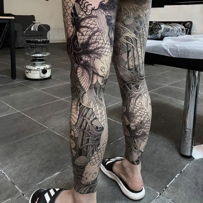 Koi fish tattoo on thigh