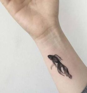 Koi tattoo on the wrist