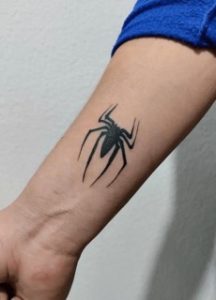 Spider Logo on wrist