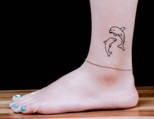 The Dolphin Tattoo On The Ankle