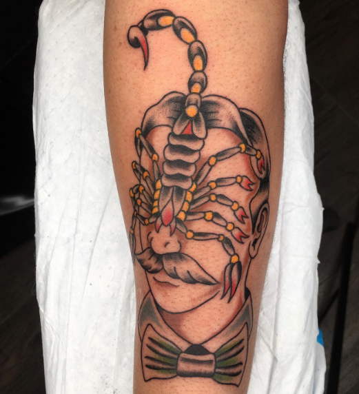 scorpion face tattoo