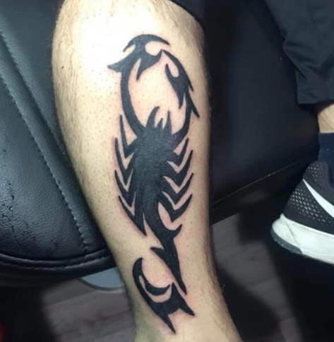 scorpion foot tattoo