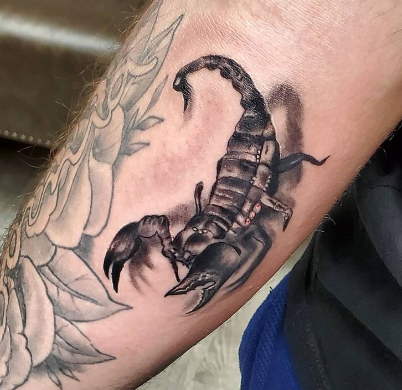scorpion forearm tattoo