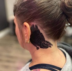 Crow ear tattoo