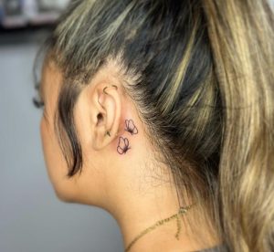 Butterfly ear tattoo