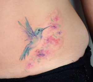Hummingbird Stomach Tattoo
