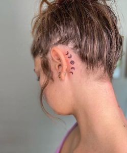 Moon ear tattoos