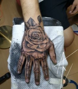 Rose Hand Tattoo with Skeleton Fingers