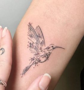 Small Hummingbird Hand Tattoo