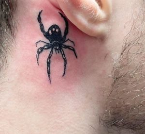 Shadowed Spider Ear Tattoo