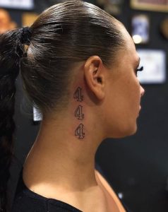 Behind the ear tattoo for women