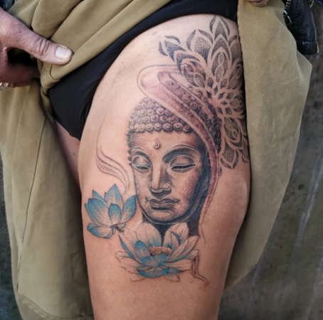 Buddha and water lily tattoo