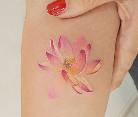 Dainty water lily tattoo