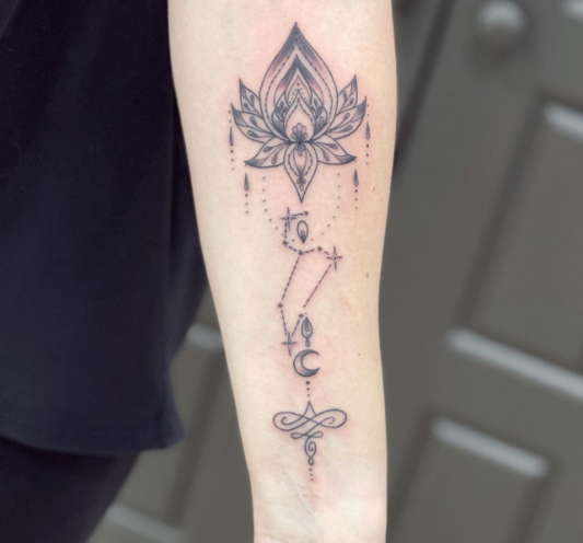 Dainty water lily tattoo