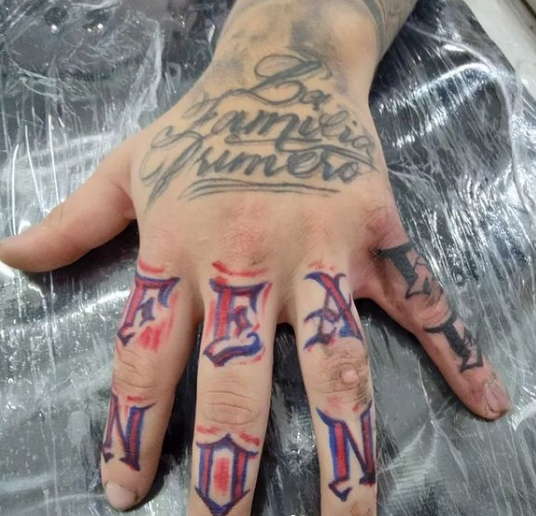 Fear None Finger Tattoo