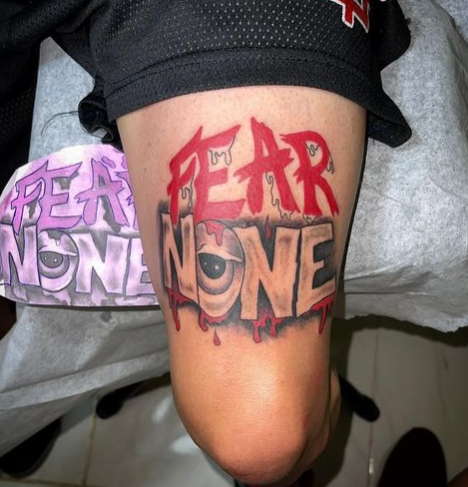Fear None Leg Tattoo