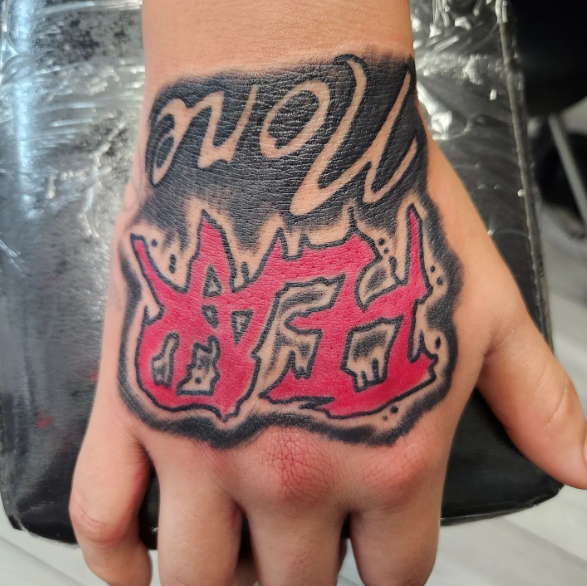 Fear None Tattoo on Hand