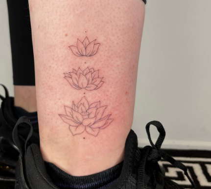 Geomaetric water lily tattoo 